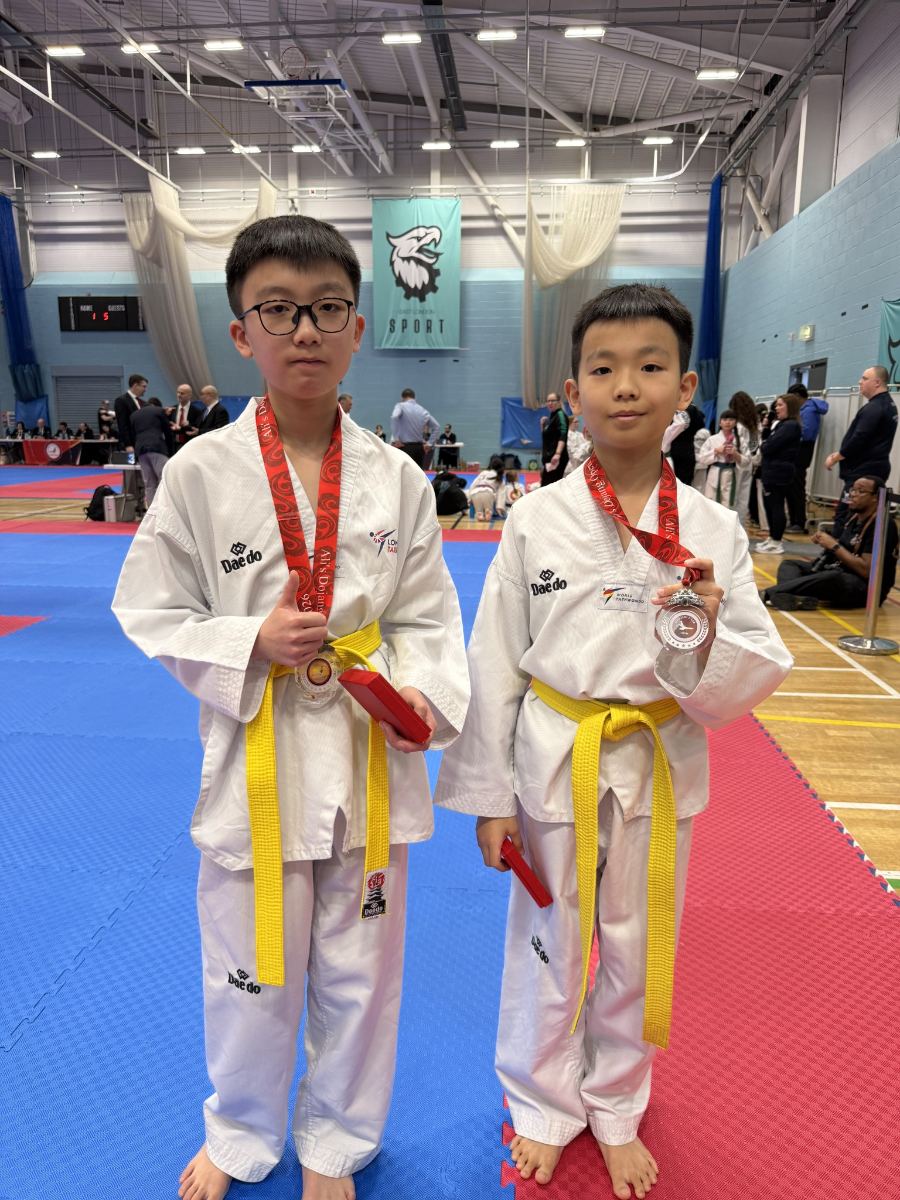 Two students with their medals