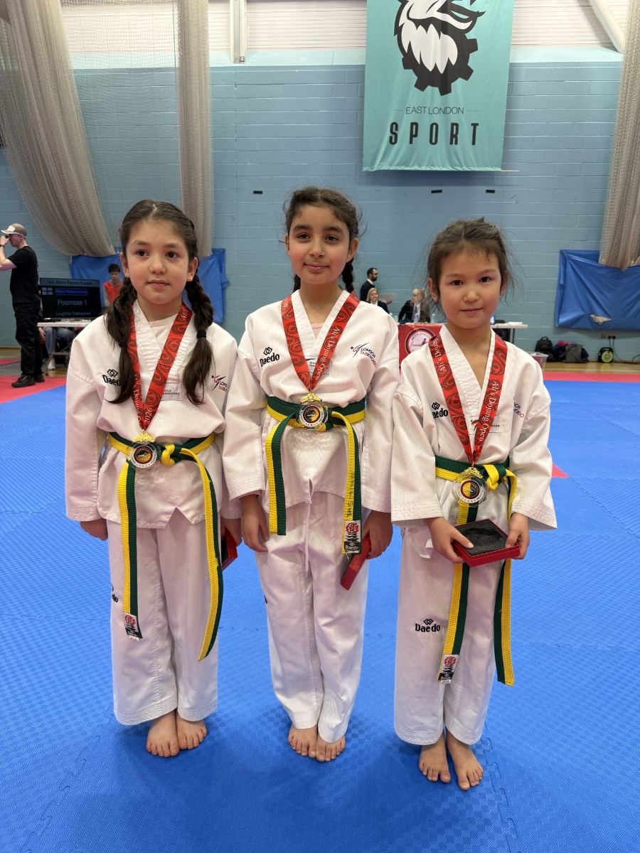 Three Panthers students with gold medals